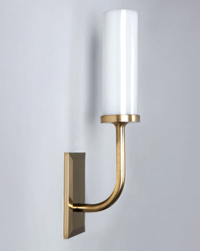 Remains Lighting Co. Collection image 1 of a Aloysius Sconce with Glass Cylinder Shade made-to-order.  Shown in Burnished Brass.