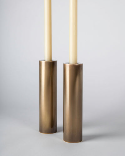 Remains Lighting Co. Collection image 1 of a Column Candlestick Tall made-to-order.  Shown in Antique Brass.