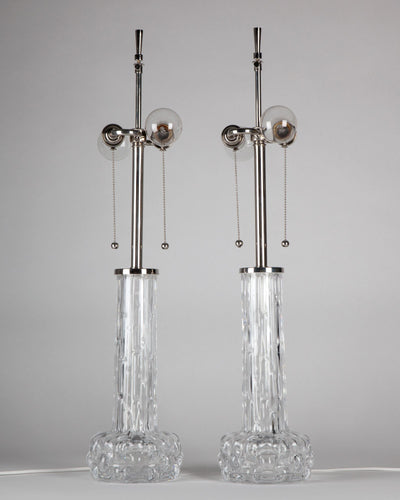 Vintage Collection image 1 of a pair of Orrefors Table Lamps with Clear Textured Glass antique in a Polished Nickel finish.