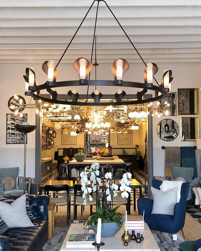 Remains Lighting Co. Collection image 1 of a Presidio 15 Chandelier made-to-order.  Shown in Weathered Brass and Blackened Steel.