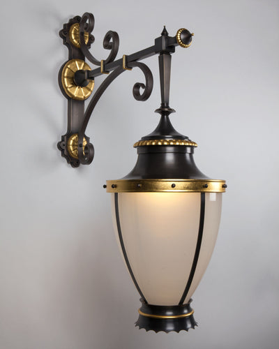  Collection image 1 of a Gilded Bronze and Opal Glass Lantern made-to-order.  Shown lit in Dark Waxed Bronze with gold leaf details.