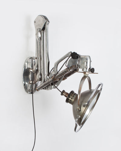 Vintage Collection image 1 of a Industrial swing-arm sconce antique.