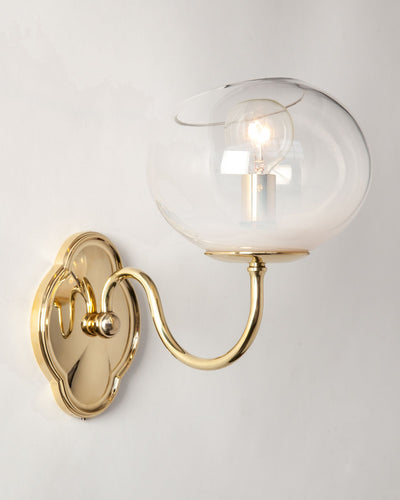 Remains Lighting Co. Collection image 1 of a Madeline Sconce with Dollop Glass made-to-order.  Shown in Polished Brass with Sfumato glass.