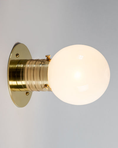 Commune Collection image 1 of a Mini Globe Sconce made-to-order.  Shown in Polished Brass.