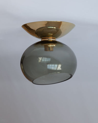 Remains Lighting Co. Collection image 1 of a Moderne Flush Mount with Dollop Glass made-to-order.  Shown in Polished Brass with Dusk glass.