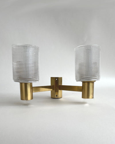 Vintage Collection image 1 of a pair of Orrefors Sconces with Textured Cylinder Shades antique in a Original Antique Finish finish.