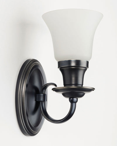 Remains Lighting Co. Collection image 1 of a Alice Sconce made-to-order.  Shown in Dark Pewter.