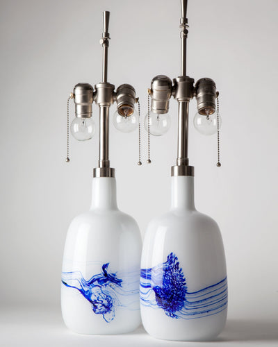 Vintage Collection image 1 of a pair of Blue and White Glass Table Lamps by Le Klint antique in a Satin Nickel finish.