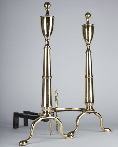 Vintage Collection image 1 of a pair of Brass Andirons with Urn Finials antique in a Original Antique Finish finish.