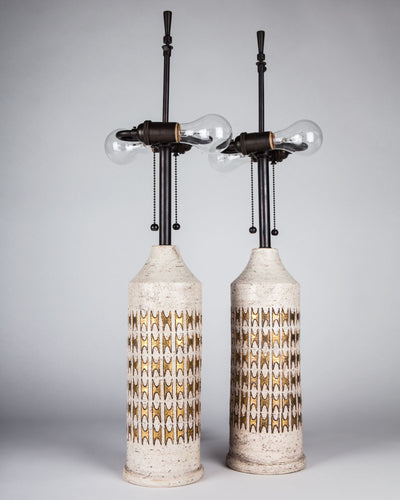 Vintage Collection image 1 of a pair of Ceramic Bergboms Lamps Glazed with Gold Geometric Patterns antique in a Dark Waxed Bronze finish.