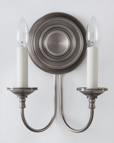 Remains Lighting Co. Collection image 1 of a Fairchild Twin Sconce made-to-order.  Shown in Light Pewter.