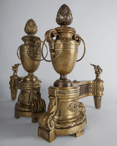 Vintage Collection image 1 of a pair of French Urn Form Chenets with Flame and Pinecone Finials antique in a Original Antique Finish finish.