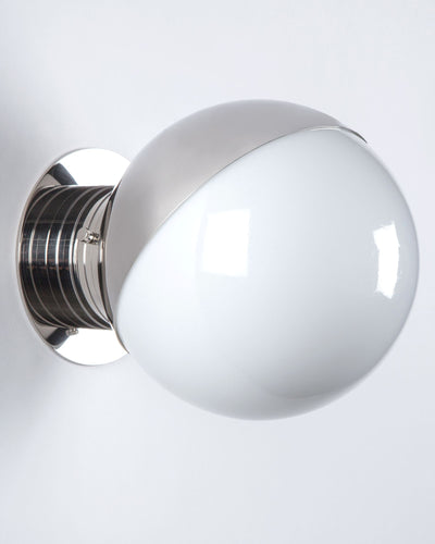 Commune Collection image 1 of a Globe Sconce with Shade made-to-order.  Shown in Polished Nickel with 45 Degree Eyelid Shade.