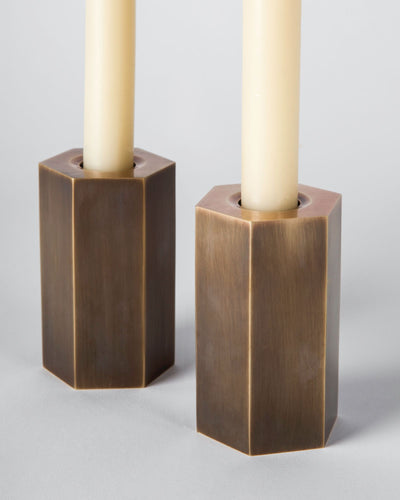 Remains Lighting Co. Collection image 1 of a Hex Candlestick Small made-to-order.  Shown in Antique Brass.