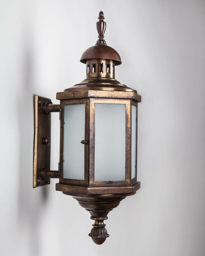 Vintage Collection image 1 of a Hexagonal Aged Bronze Wall Lantern with Frosted Glass antique in a Age-Darkened Brass finish.