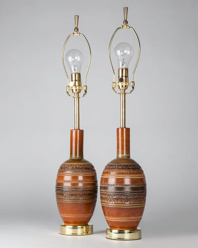 Vintage Collection image 1 of a pair of Italian Ceramic Table Lamps antique in a Polished Brass finish.