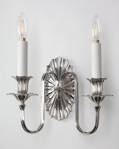 Remains Lighting Co. Collection image 1 of a Soleil Twin Sconce made-to-order.  Shown in Polished Nickel.