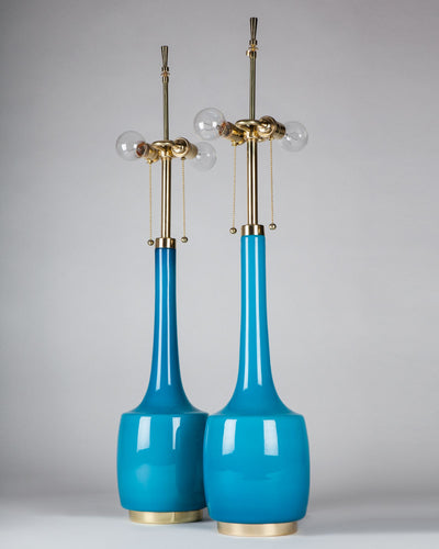 Vintage Collection image 1 of a pair of Turquoise Blue Glass Bergboms Lamps antique in a Polished Brass finish.