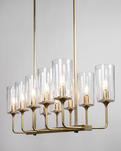 Remains Lighting Co. Collection image 1 of a Veronique Linear 10 Chandelier with Glass Shades made-to-order.  Shown in Burnished Brass with clear glass shades.