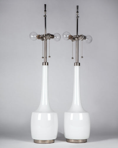 Vintage Collection image 1 of a pair of White Cased Glass Bergboms Table Lamps antique in a Polished Nickel finish.