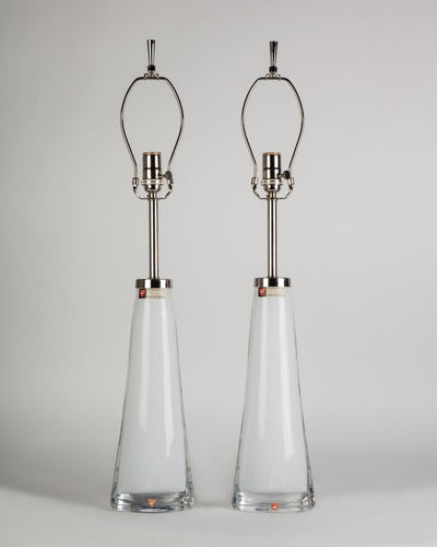 Vintage Collection image 1 of a pair of White Cased Glass Orrefors Table Lamps antique in a Polished Nickel finish.