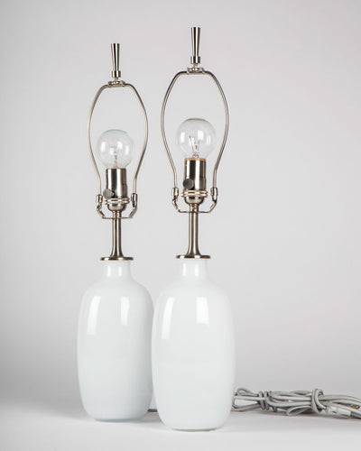 Vintage Collection image 1 of a pair of White Glass Melody Table Lamps by Holmegaard antique in a Nickel finish.